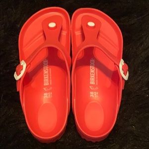 Coral pink plastic “thong” Birkenstock’s